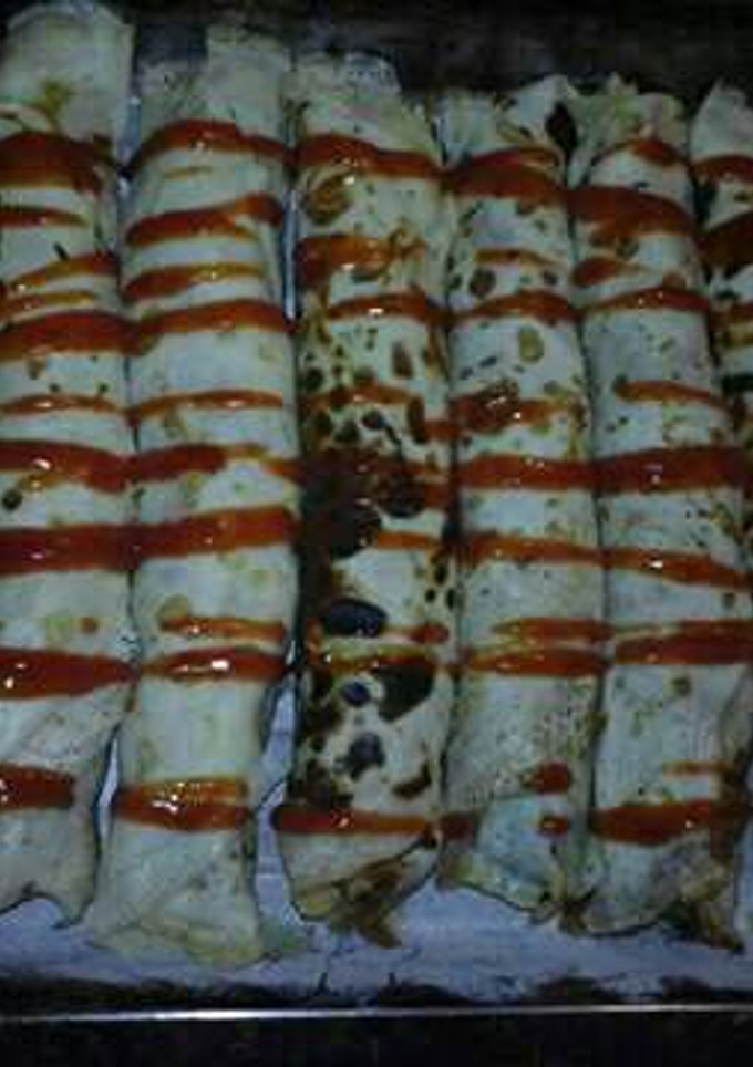 Una foto de Canelones de carne y espinaca!!!