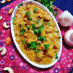 Almond and cashew nuts loaded mushroom curry A picture of Almond and cashew nuts loaded mushroom curry.