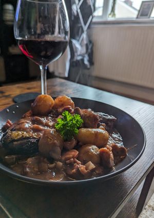 A picture of Coq Au Vin With Baby Potatoes.