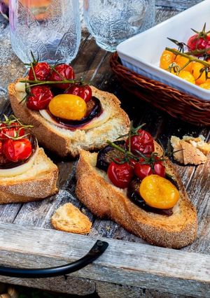 A picture of Crostoni with Figs and Confit Cherry Tomatoes.