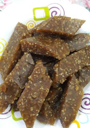 عکسی از دستور باسلوق با شیره خرما و کنجد