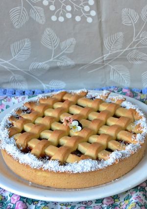 Una foto de Pasta frola de naranja y membrillo con pasas de uvas al oporto🧉
