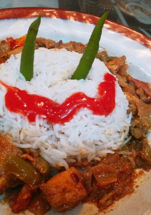 A picture of Shashlik🍛 with white rice🍚.