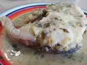 Una foto de merluza en salsa verde