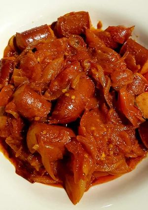 A picture of Smoked Sausage in tomato chutney.