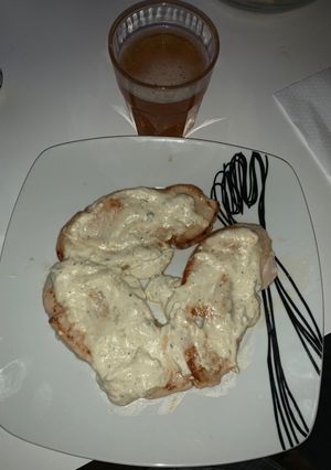 Una foto de Pechugas de pavo con salsa de pimienta