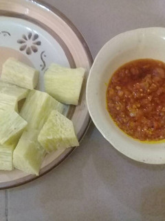 A picture of Yam and local sauce.