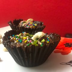 A picture of Choco phirni in Chocolate cups.