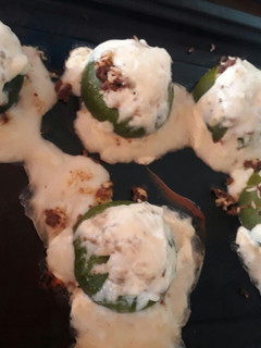Una foto de Zapallitos rellenos con salsa blanca light
