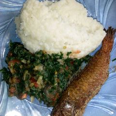 A picture of Ugali+fish+spinach.