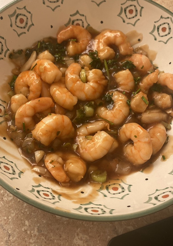 Una foto de Langostinos en salsa de ostras