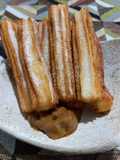 Churros con dulce de leche