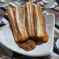 Una foto de Churros con dulce de leche