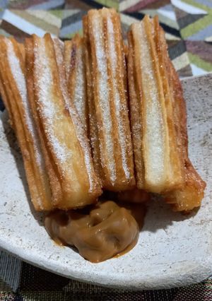 Una foto de Churros con dulce de leche