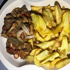 A picture of Shredded chicken and chips.