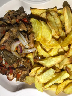 A picture of Shredded chicken and chips.