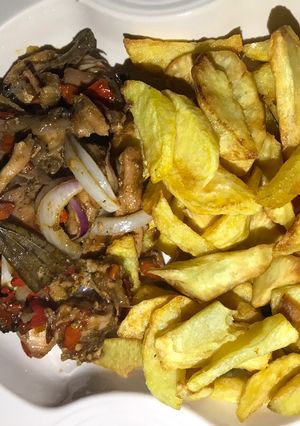 A picture of Shredded chicken and chips.