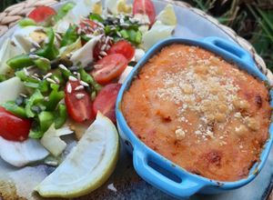 Une photo de Parmentier de daurade avec une purée de légumes