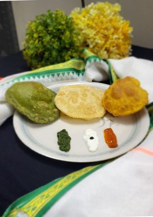 A picture of Tricolour Poori / Luchi.