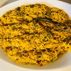 A picture of Ground chicken and peas mix rice 🍚 (chicken qeema biryani).