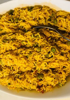 A picture of Ground chicken and peas mix rice 🍚 (chicken qeema biryani).