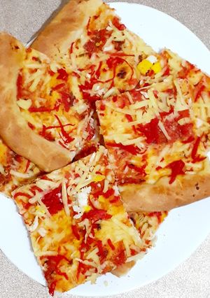صورة لوصفة بيتزا محشية الجوانب روعة 😋😋