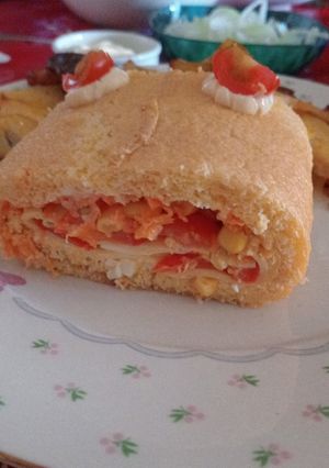 Una foto de PIONONO RELLENO DE QUESO, CHOCLO, CHERRY Y ZANAHORIAS
