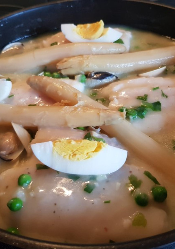 Una foto de Merluza en salsa verde