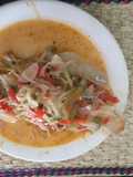 Filete de pescado blanco de Alaska en salsa clara