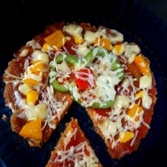 A picture of Leftover upma pizza.