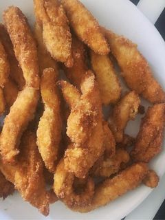 Una foto de Fingers de pollo sin gluten marinados en miel y mostaza dulce
