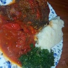 Fish stew and spinach A picture of Fish stew and spinach.