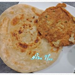 A picture of Egg and Lachaay dar Paratha.