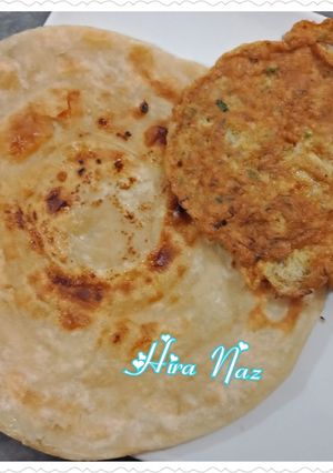 A picture of Egg and Lachaay dar Paratha.