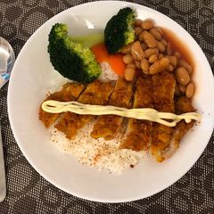 A picture of Pork chop breaded with Cheese crackers.