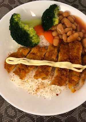 A picture of Pork chop breaded with Cheese crackers.