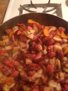 A picture of Sausage and potatoes .