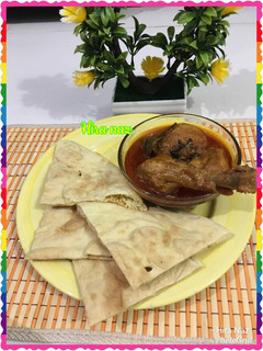 A picture of Chicken Qorma With Nan..