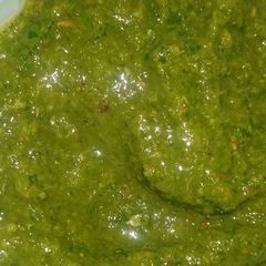 A picture of Amla chutney with tadka.