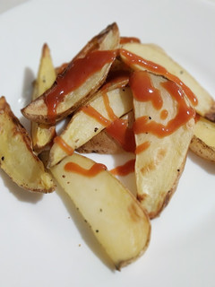 Una foto de Papas fritas en freidora de aire caliente