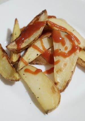 Una foto de Papas fritas en freidora de aire caliente