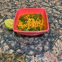 A picture of Sev tomato curry.