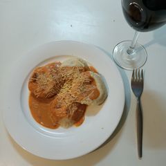 A picture of Ham and cheese tortelloni / sorrentinos.