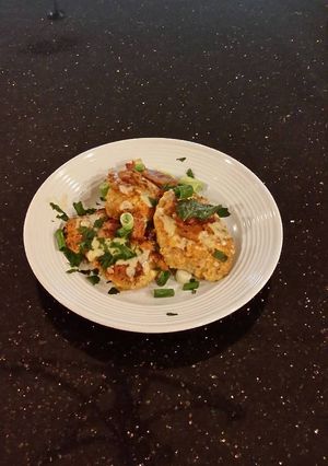 A picture of Pork Tenderloin with Bacon and Cheese.