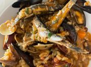 Una foto de mejillones pulpitos arroz