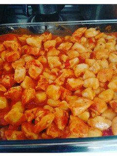 Una foto de Ñoquis de papa con salsa con pollo