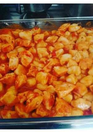 Una foto de Ñoquis de papa con salsa con pollo