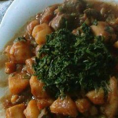 A picture of Matoke and Irish Potatoes with meat and Authentic mixed vegetabl.