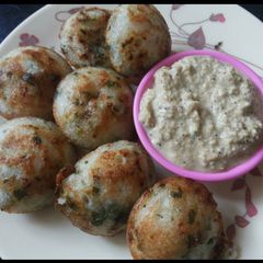 A picture of Appam with veggies is very healthy for kid.
