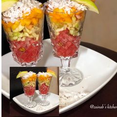 A picture of Fruit salad🍉🥥🍎🍍.